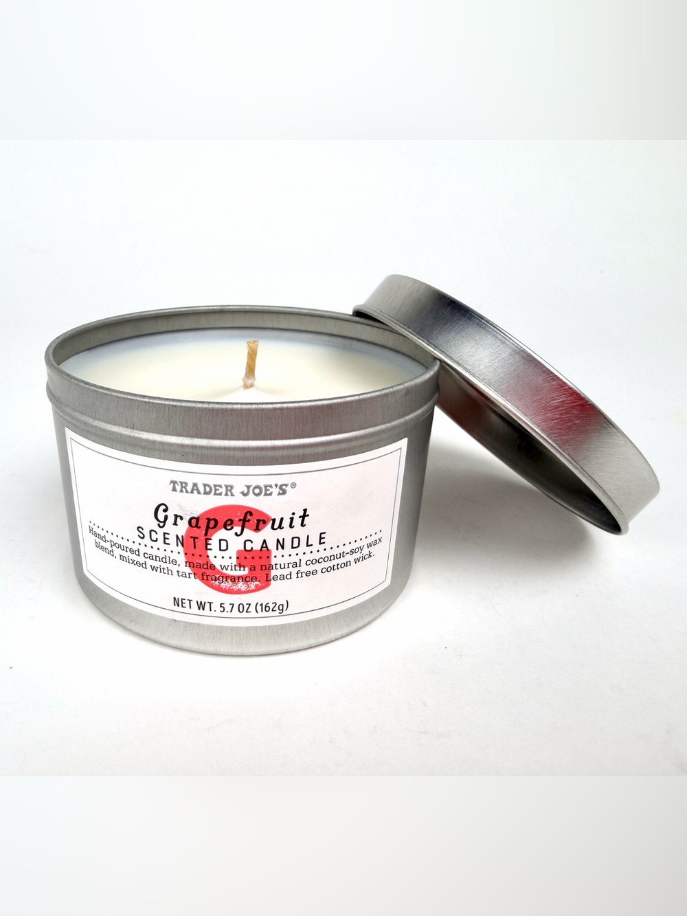 Trader Joe’s Grapefruit Scented Candle, NWT.